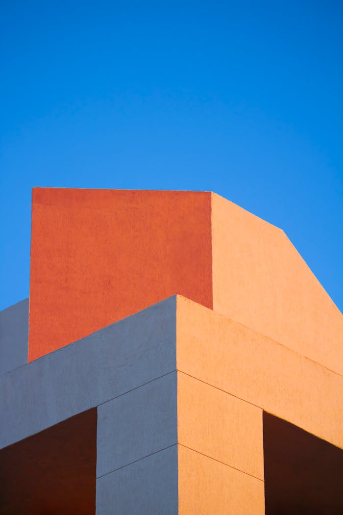 Geometric architectural shapes against a vibrant blue sky in San Luis Potosí.